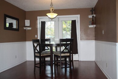 French doors open to back yard