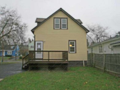 Exterior Back. The rear of the home includes a new