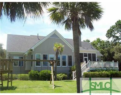 Exterior Back. Back View. Large Screened Porch wit