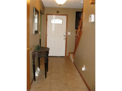 11' x 4' Tiled Foyer and half bath door