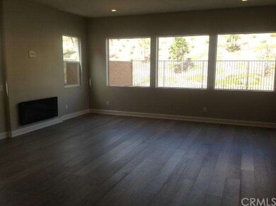 Great room (actual home shown)