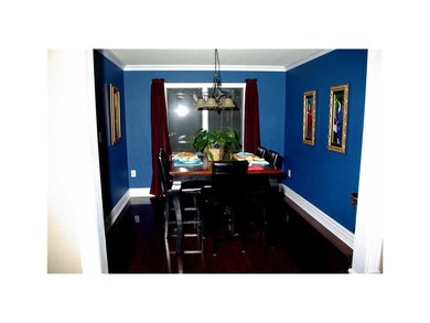 Dining Area. Formal dining room with rich new wood