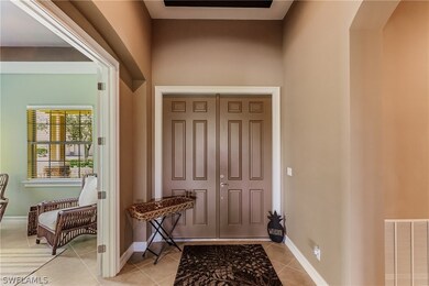 Large Foyer with high ceilings greet you as you en