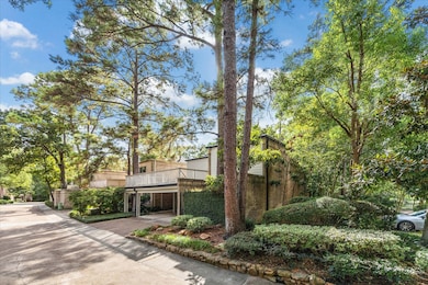 This charming 2 story townhome sits on a corner lot surrounded by mature trees and flourishing vegetation.