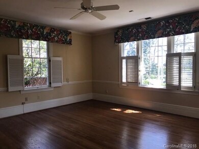 Master bedroom on main level, hardwoods and custom
