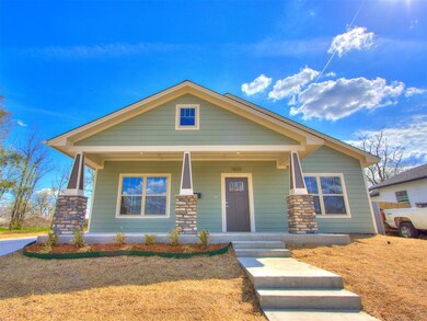 View of front of home featuring covered porch and 