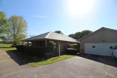 Attached Garage and Paved Driveway