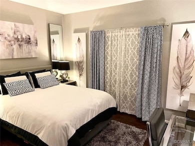 Bedroom featuring wood finished floors