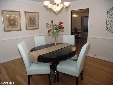 Other - Formal dining room with oak floor, crown a