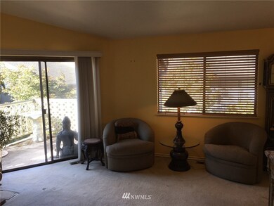 Living room with direct access to sunny deck.