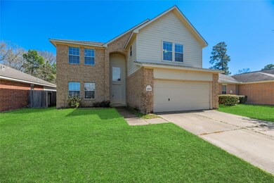 Lovely 2-story brick home with a 2-car garage and