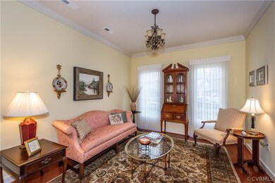 Living room or office with wood floors, plantation