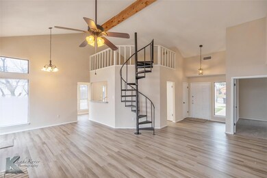 Entrance foyer featuring ceiling fan with notable 
