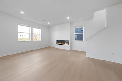 (Photo of a very similar home, actual finishes may vary)