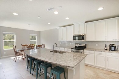 Ashen Granite Counters and Subway Tile Backsplash!