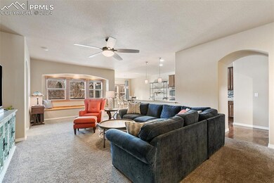 Large living room with window seat.