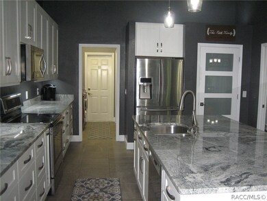Beautiful Granite Counters & SS Appliances