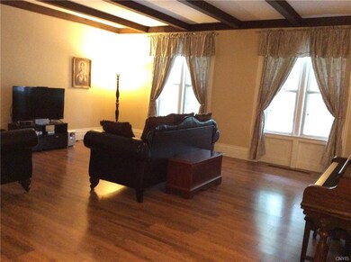Large living room with beamed ceiling!