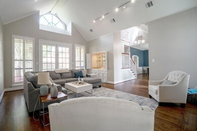 Large windows add to the natural light of the room