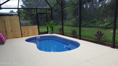 2253 Spring Creek Cir NE, Palm Bay, FL 32905 - photo 2