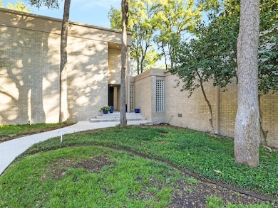 View of home's exterior and spacious lot and priva