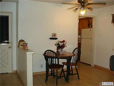 The dining room is open to the living room