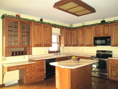 Full View of Kitchen with Desk Area
