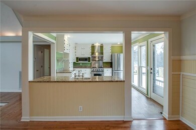 The Separate Dining Area is located directly off of the living room and kitchen. 