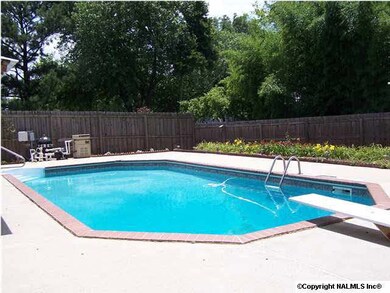 . . . . with access and views of this beautiful in-ground pool just steps away for your enjoyment.