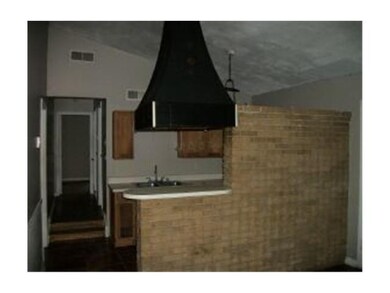 View from breakfast room into kitchen.