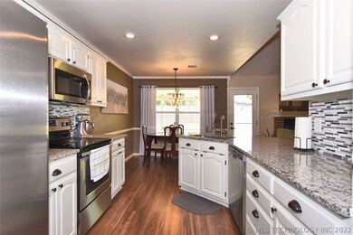 Beautiful granite & sink redone in 2017.  Floors i