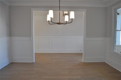 View from dining room into foyer. Representative photo of the Rebecca interior, may include additional options