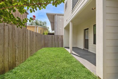 This outdoor retreat is perfect for pets, play, or relaxing. The fenced setting provides privacy and a low-maintenance outdoor retreat.
