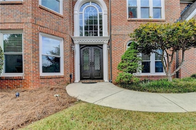 Property entrance with brick siding