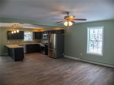 Spacious living area with tile...