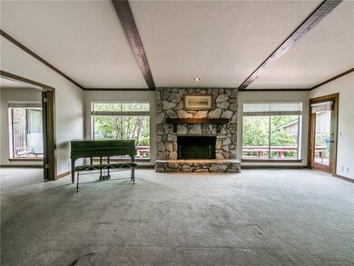 Walk in the front door to spacious den that looks 
