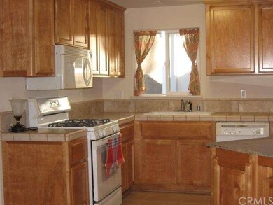 Gas stove and stone tile counters