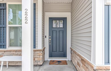 Property entrance with stone siding
