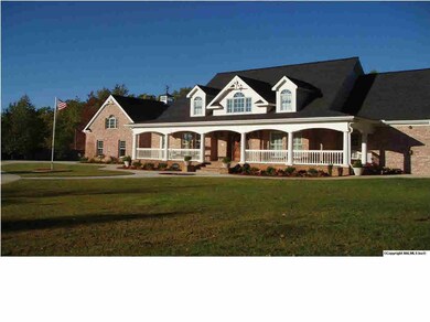 Another view of the front of the home. It is fully fenced and cross fenced. This home has an irrigation system front & back.