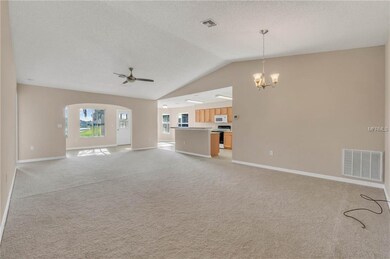 View into Dining Area, Living Room and Florida Room. New fixtures, pain and carpet