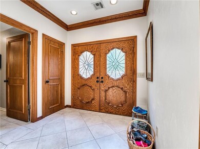 Double-door entry with a huge foyer