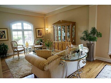 Living Room. The living room is open to the foyer 