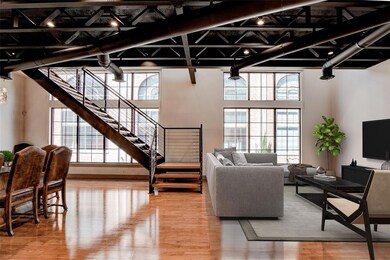 The second floor contains the living room, dining 