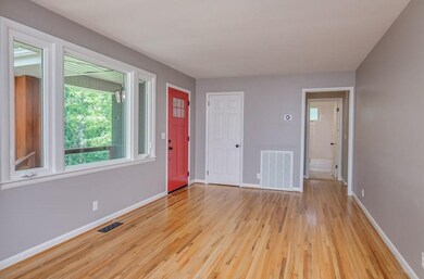 Down this hallway are the bedrooms and one of the 