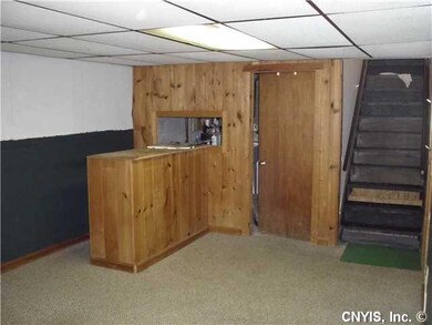 Family Room Basement Family Room,  Door to laundry