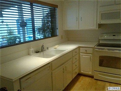 kitchen with window to front patio