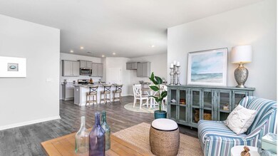 Living room with dark hardwood / wood-style floors