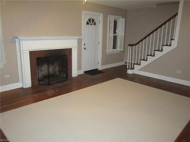 LIVING ROOM AREA...NEW DOOR, WOOD BURNING FIREPLAC