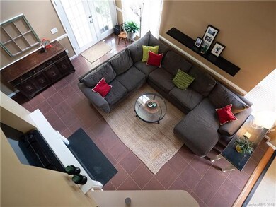 View of the 2-story living room from the upstairs 