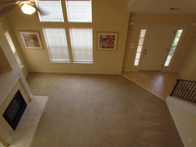 The two-story living room offers wonderful space a